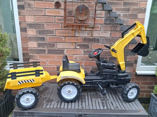 Ride tractor with peddles - on,